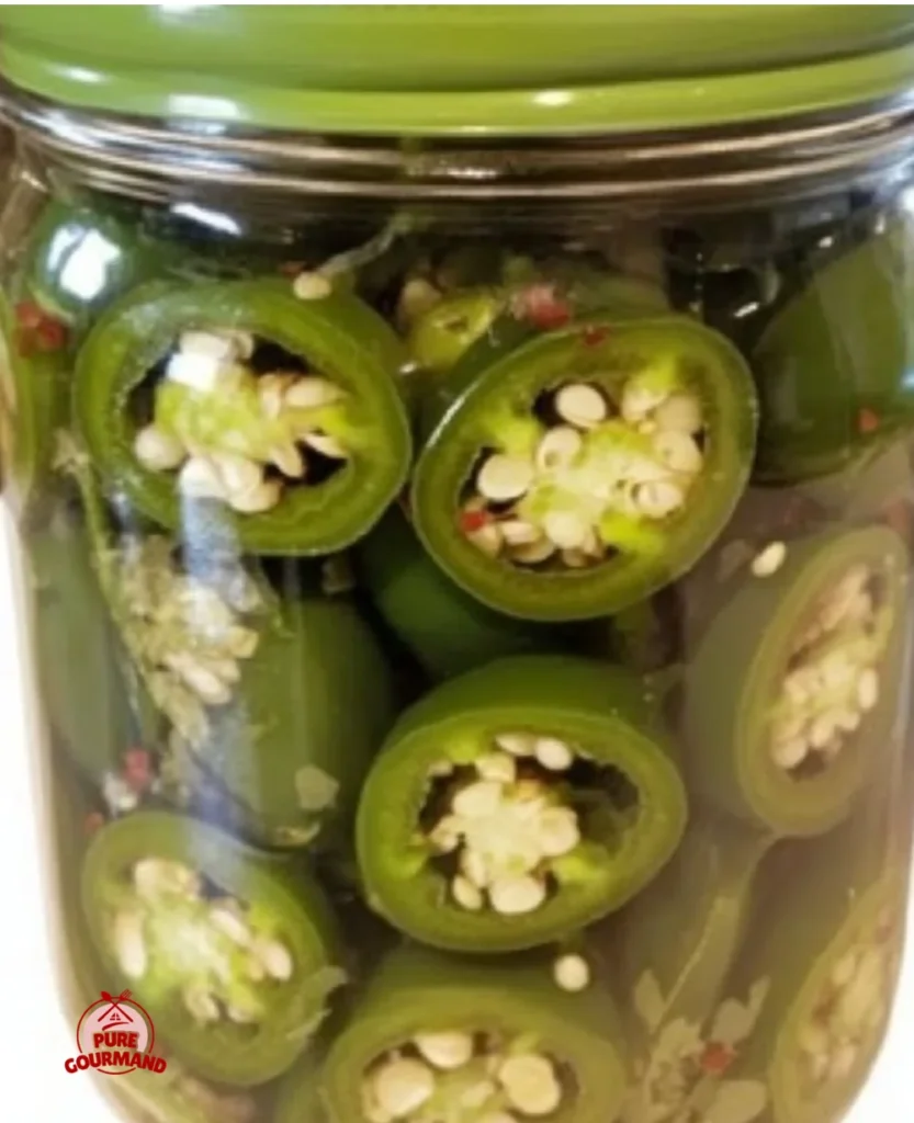 Easy refrigerated jalapeño pickles in a jar with fresh ingredients