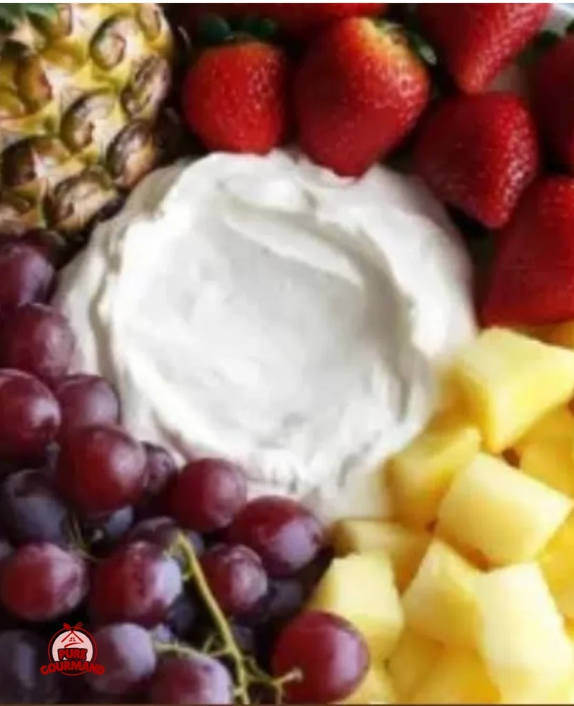 Delicious cream cheese marshmallow fruit dip served with fresh summer fruits.