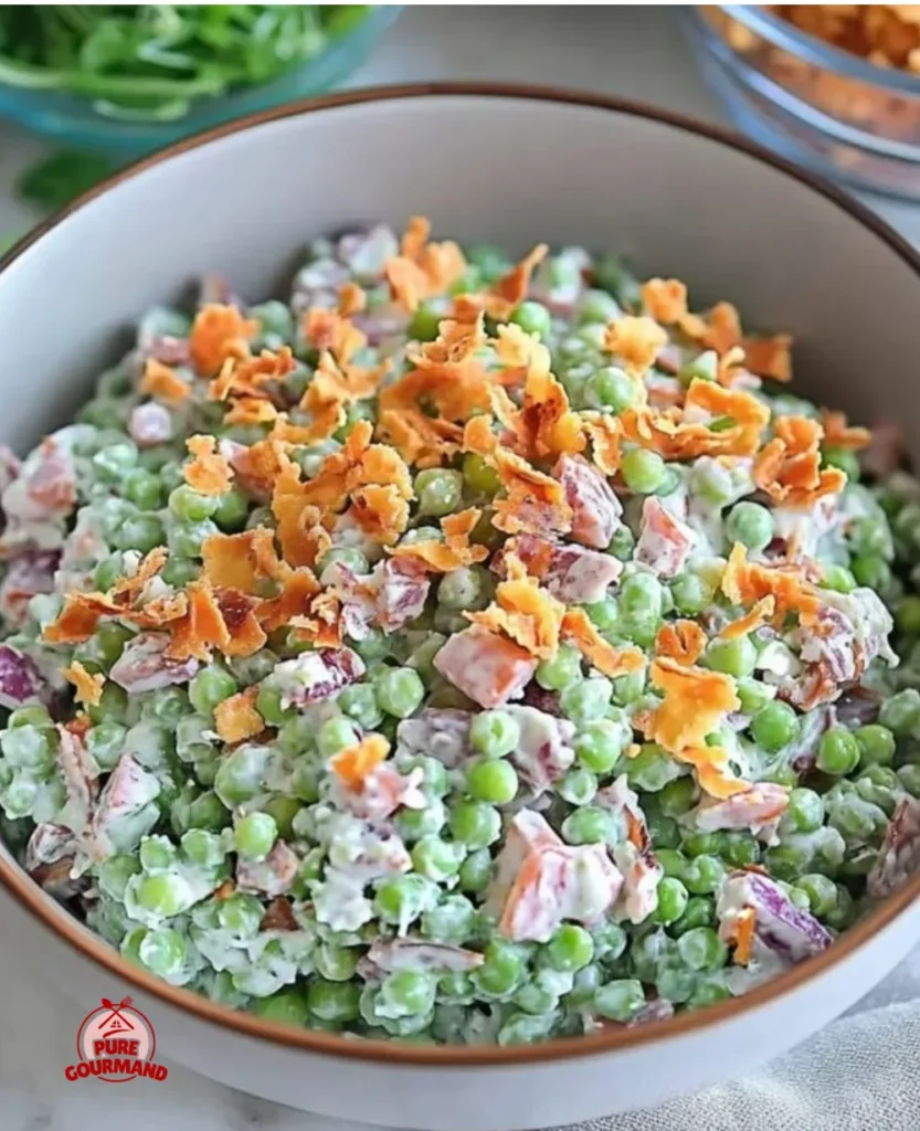 Creamy low-carb pea salad served in a bowl, ideal for gatherings