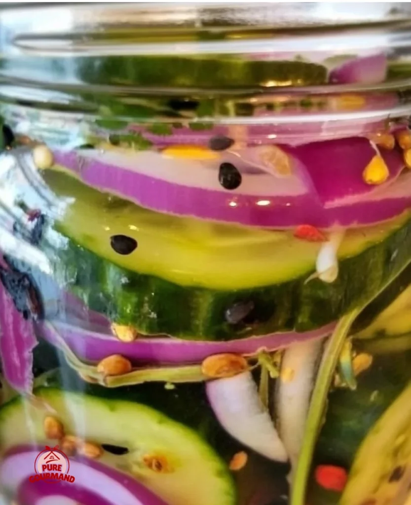 Quick pickled cucumber and red onion in a jar, fresh and crunchy