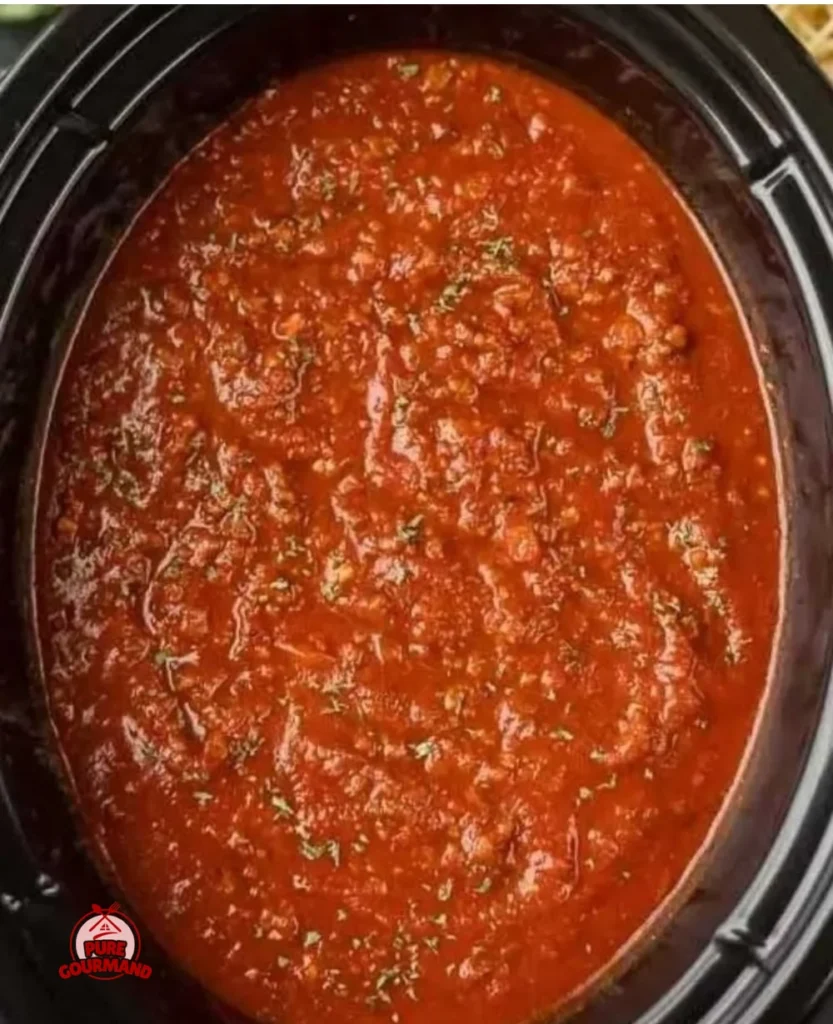 Plate of homemade Italian pasta with classic tomato sauce garnished with basil