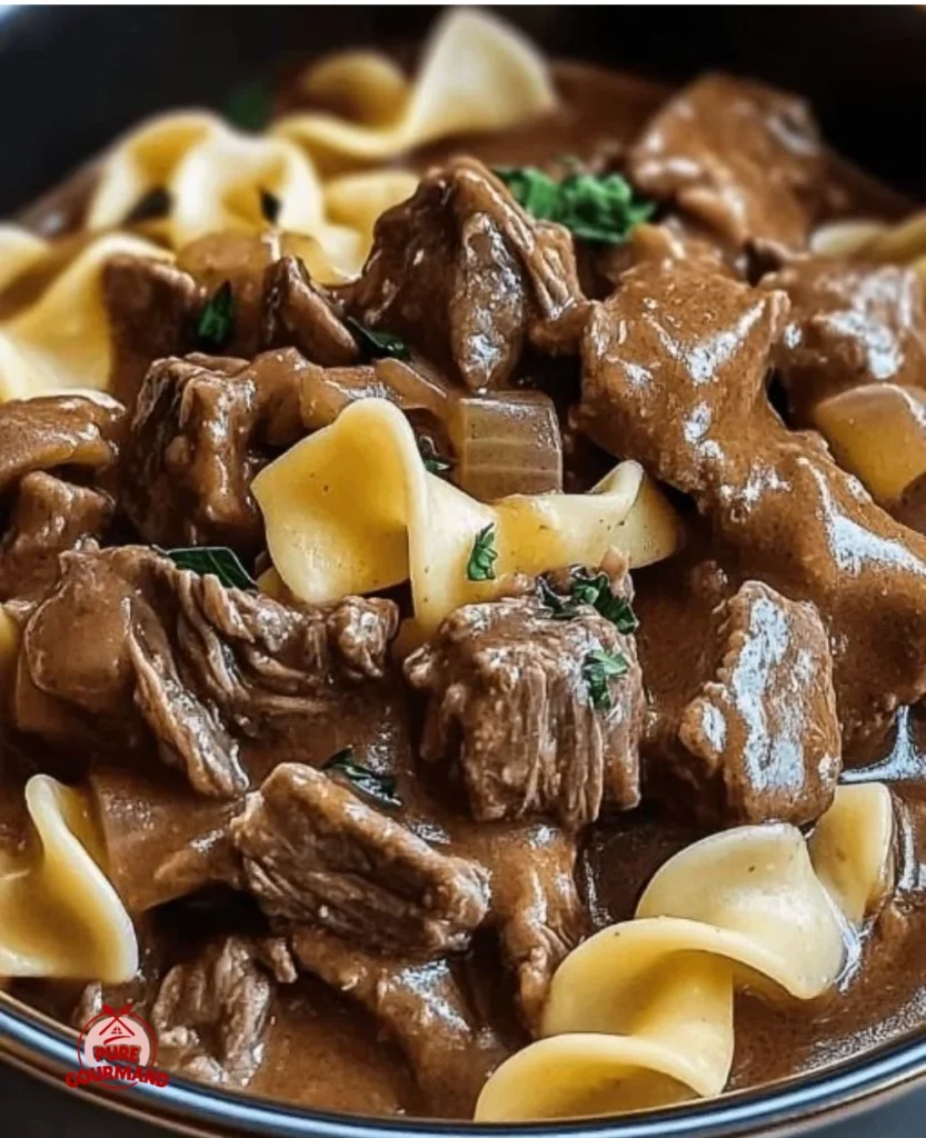 Slow cooker beef and noodles dish served in a bowl for a comforting meal