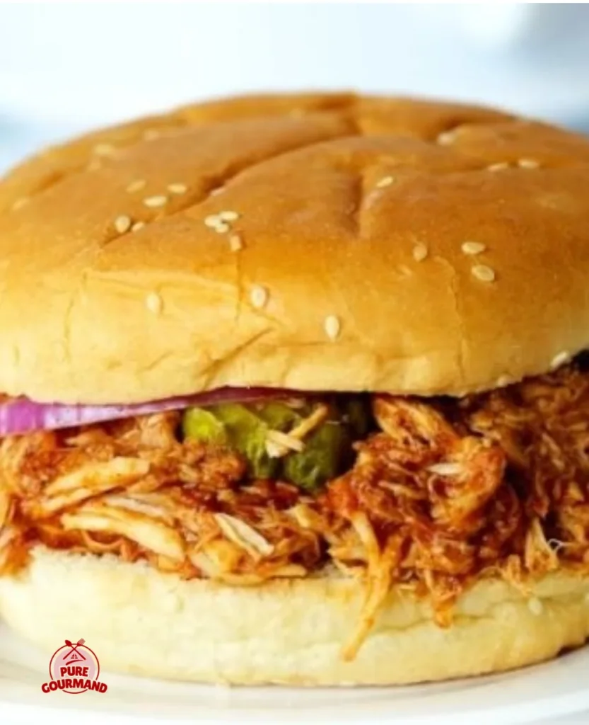 Slow cooker pulled chicken served with toppings and sides