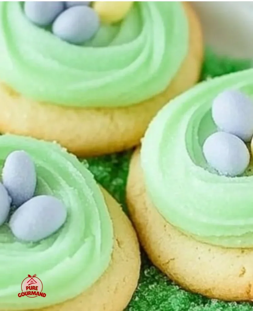 Decorative Springtime Nest Sugar Cookies with pastel colors and chocolate eggs