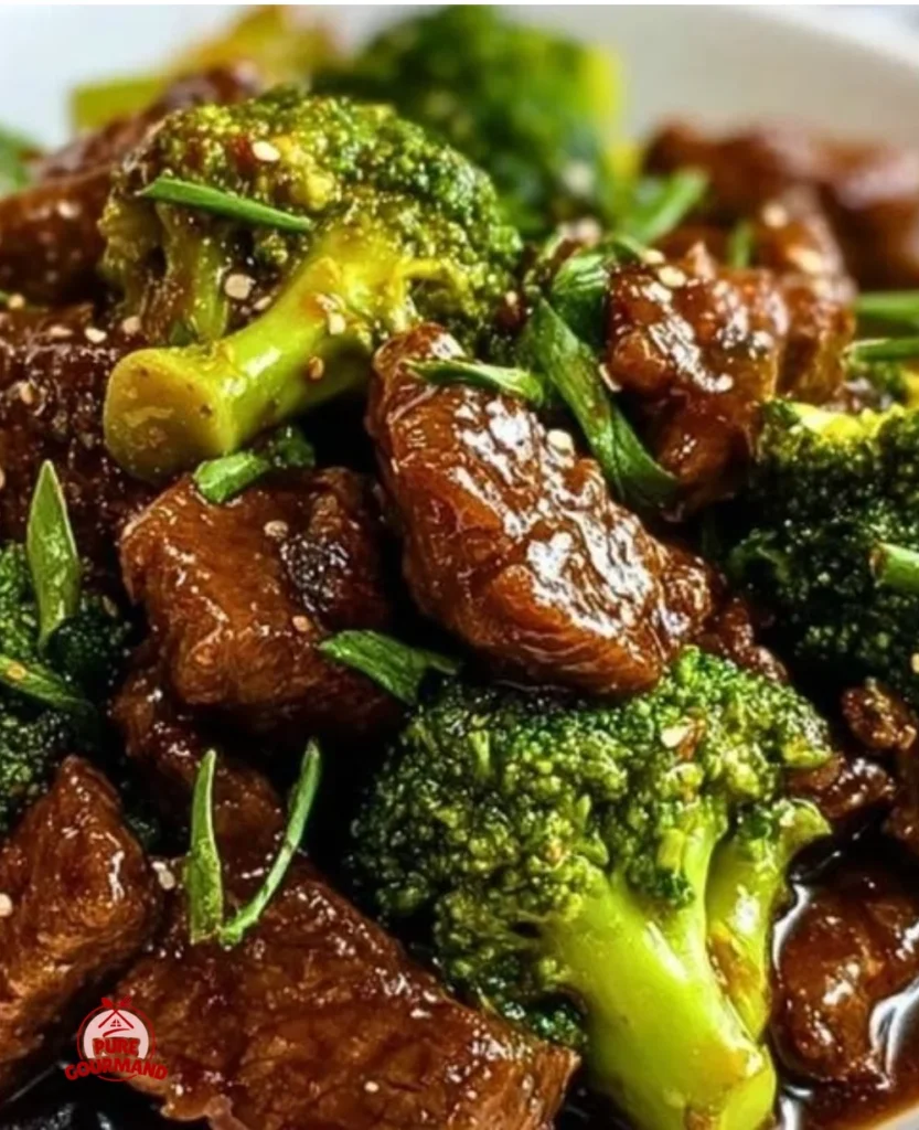 Delicious beef and broccoli stir-fry served in a bowl with sesame seeds.