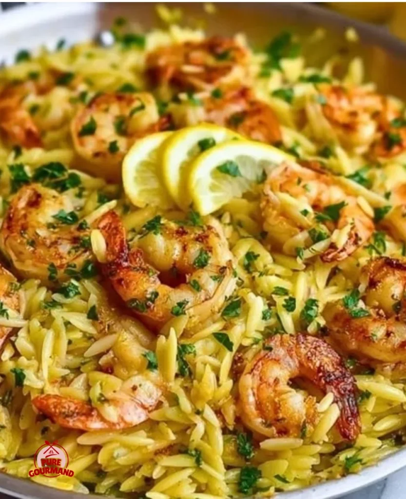 Delicious Lemon Garlic Shrimp Orzo served in a bowl, garnished with parsley.