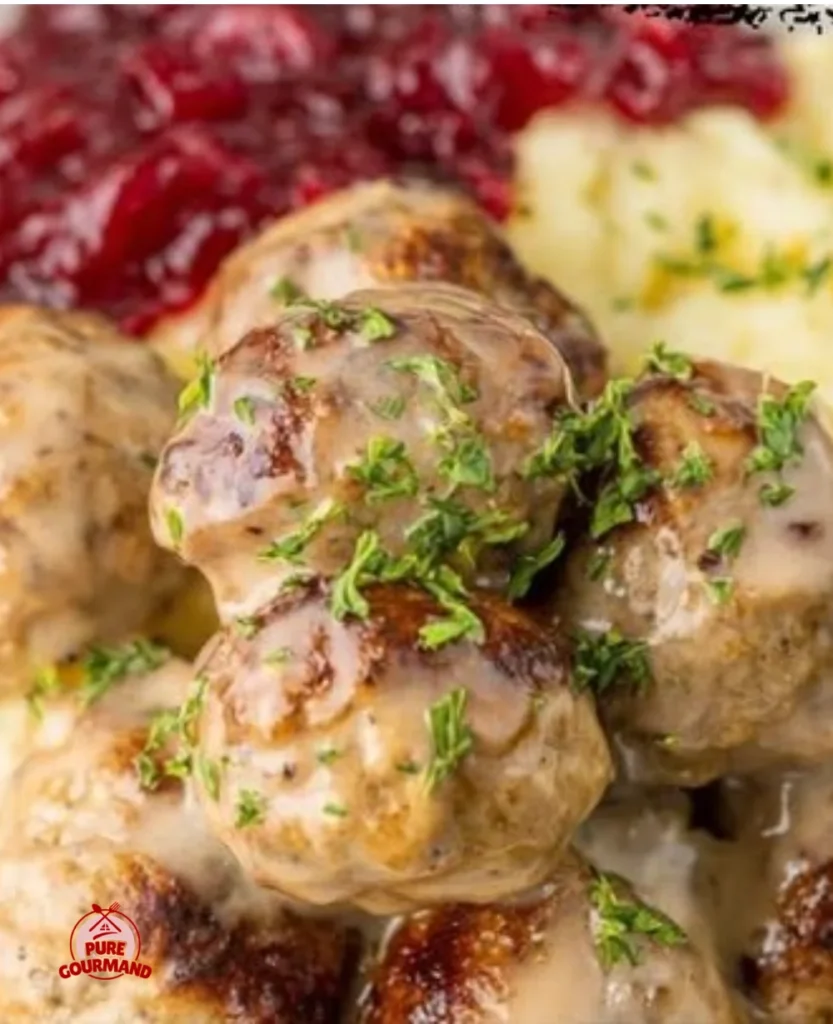 Delicious Ikea Swedish meatballs served with creamy sauce and lingonberry jam.