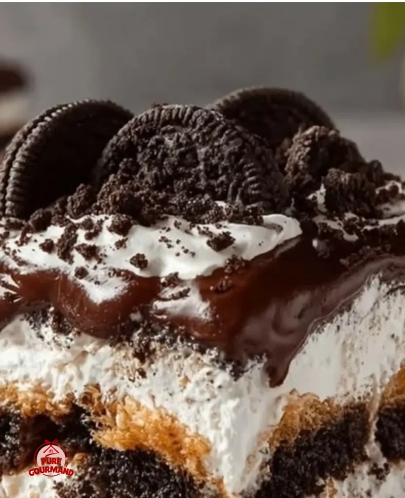 Deliciously layered chocolate lasagna dessert topped with chocolate shavings.