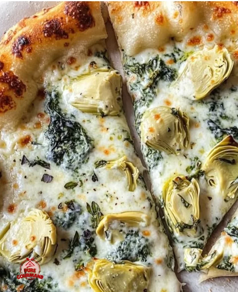 Delicious artichoke pizza with spinach parmesan cream sauce