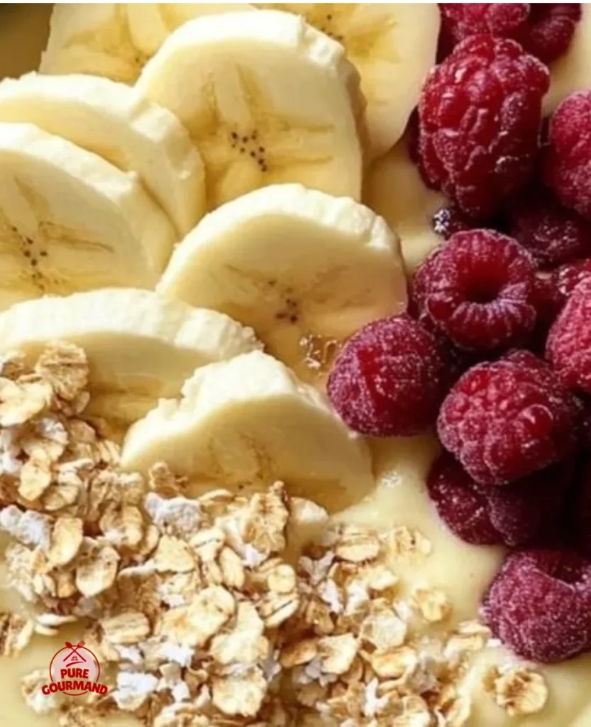 Delicious piña colada smoothie bowl topped with fresh fruits and coconut flakes