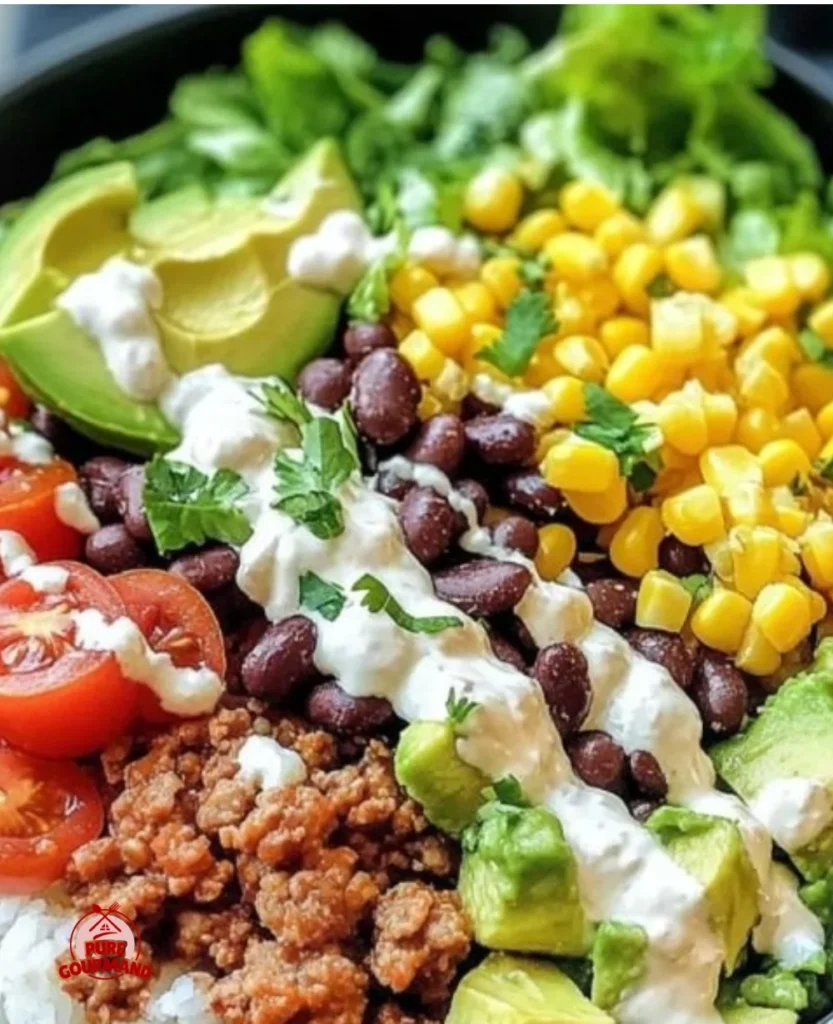 Delicious Taco Bowl recipe with colorful ingredients in a serving bowl.