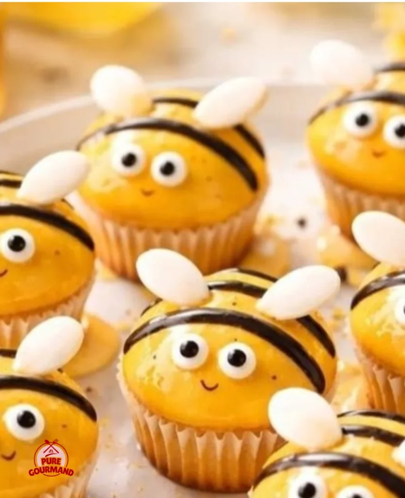 Colorful cupcake bees decorated for a fun and festive dessert experience.