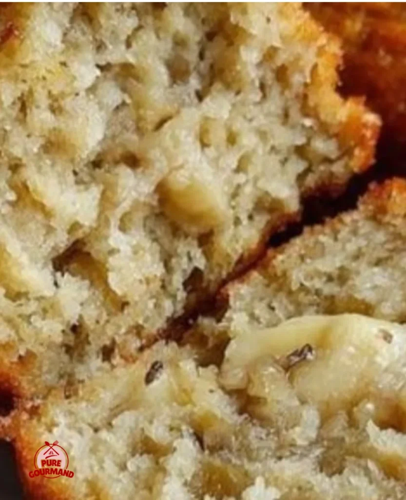 Healthy Greek yogurt banana muffins, moist and protein-packed, on a plate.