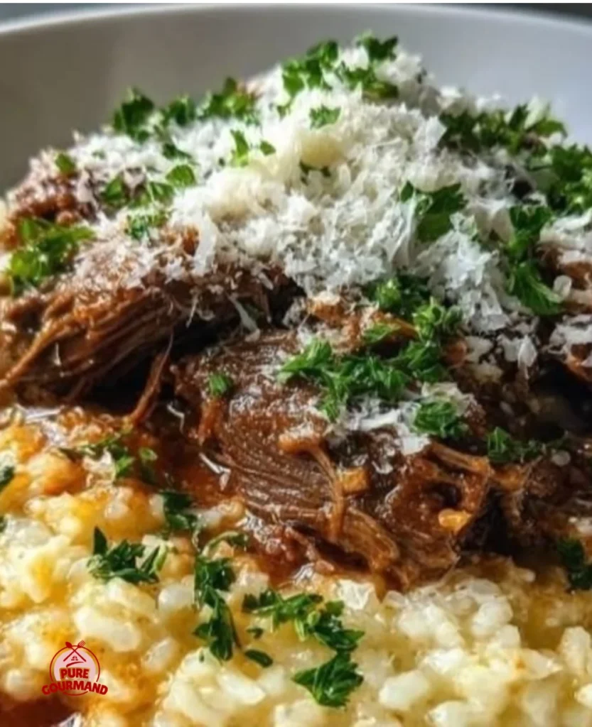 Italian pot roast with Parmesan risotto served on a plate