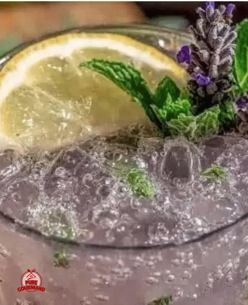 A refreshing glass of lavender lemonade garnished with lavender sprigs