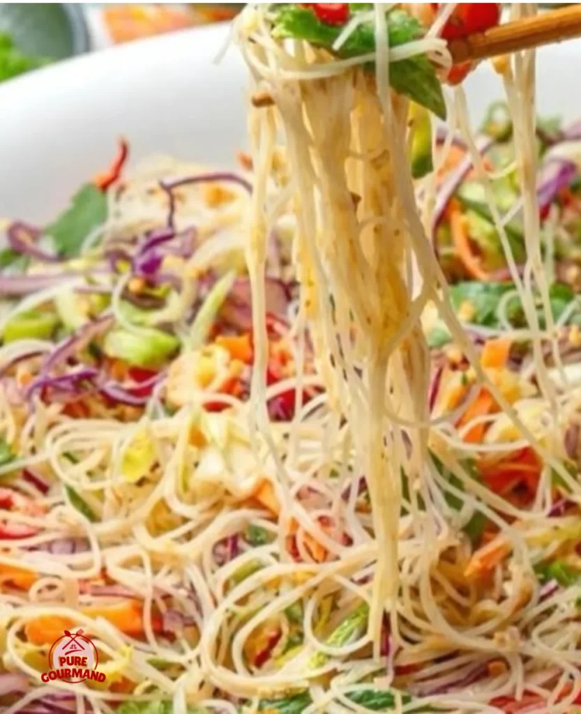 Colorful spring roll salad with fresh vegetables and herbs
