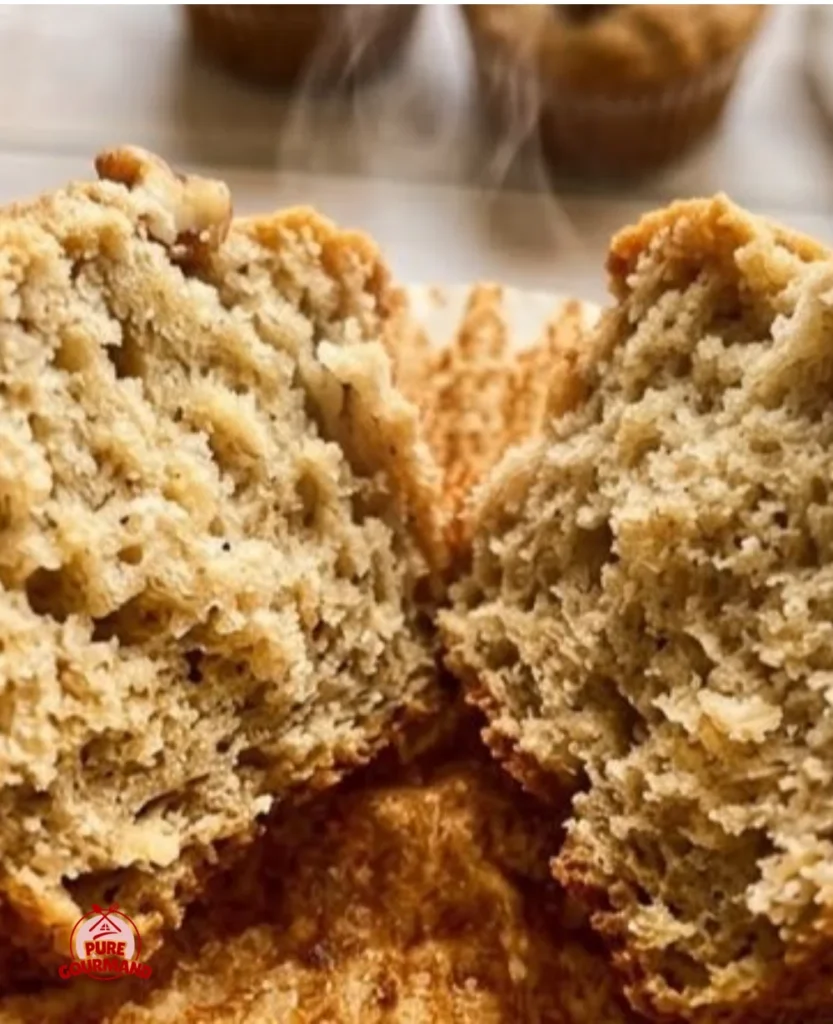 Freshly baked banana bread muffins with ripe bananas and walnuts