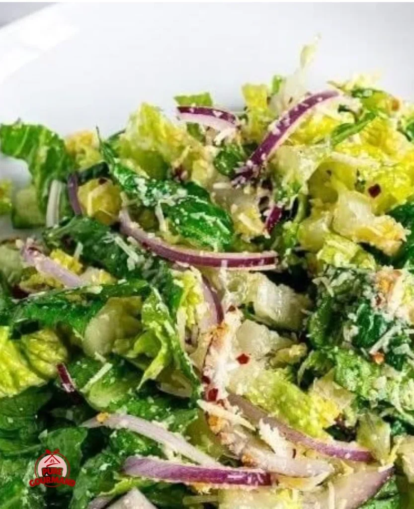 Fresh and bright lemon parmesan salad with lettuce and parmesan cheese