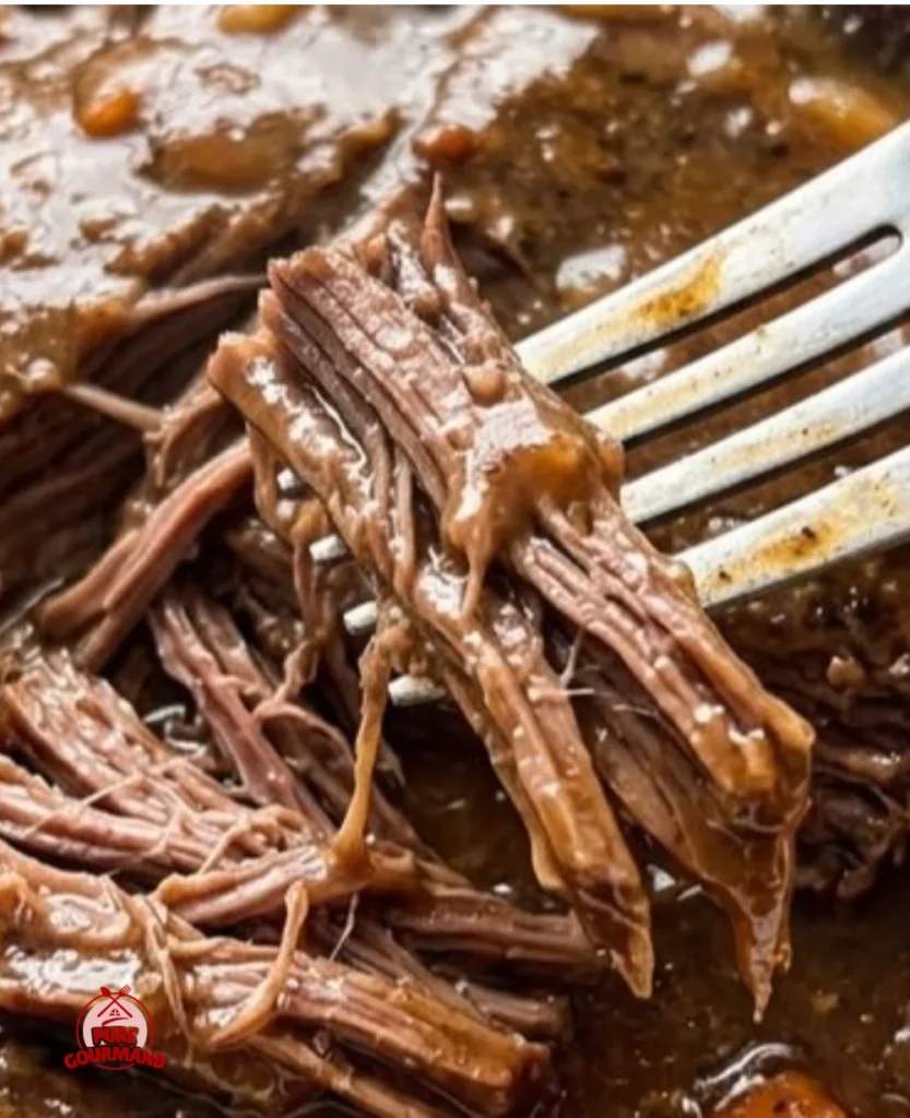 Slow Cooker Pot Roast served with vegetables on a dinner table
