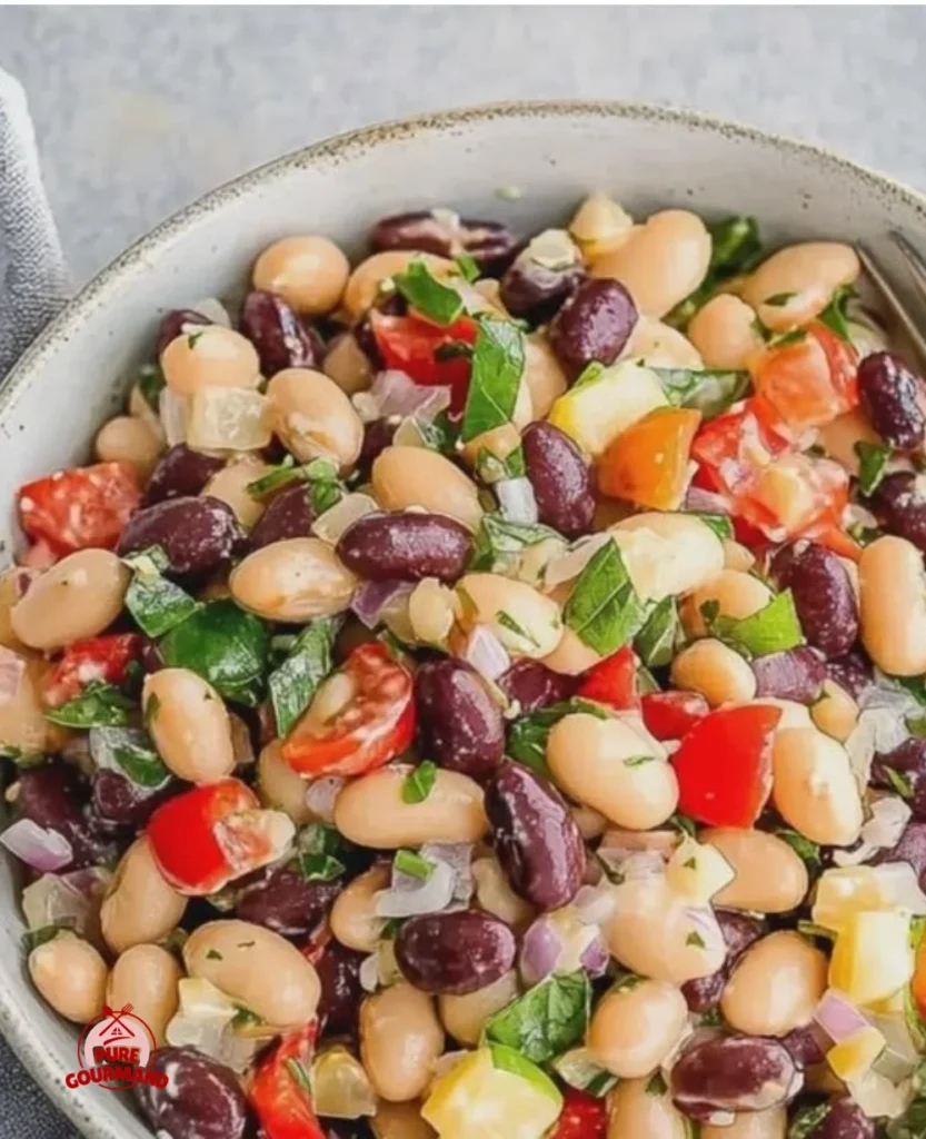 Fresh lemon basil three bean salad served in a bowl, perfect for summer meals.