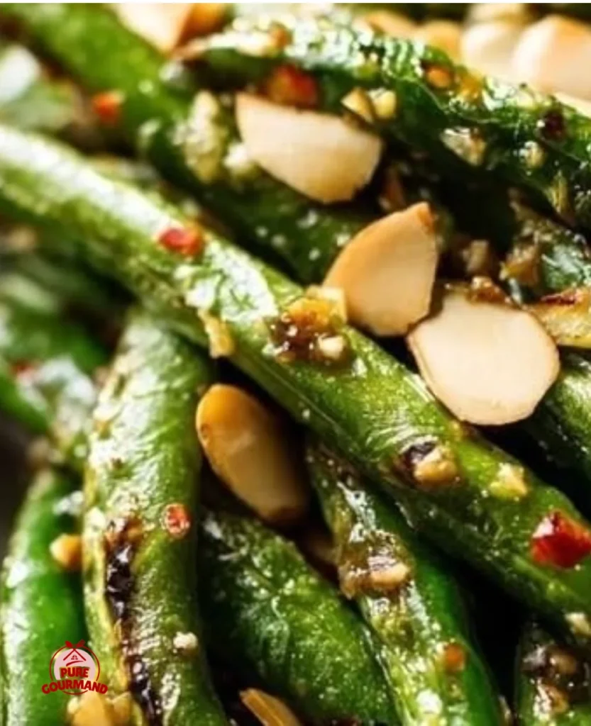Plate of blistered string beans sautéed with garlic and lemon