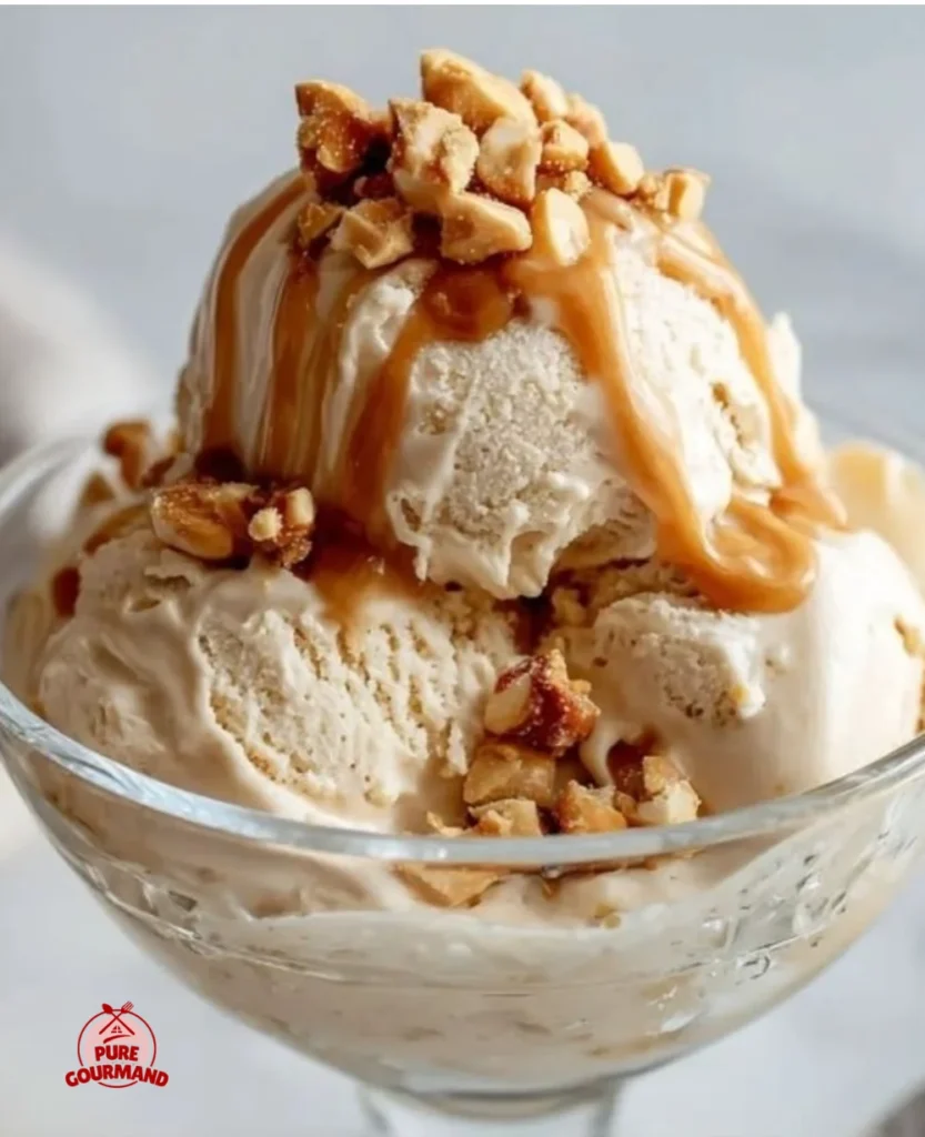 Creamy peanut butter frozen yogurt served in a bowl with a spoon
