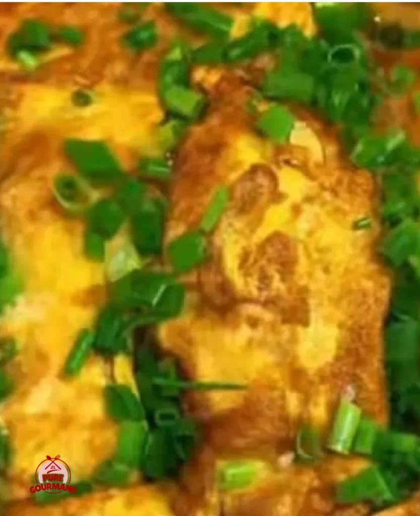 Delicious minced meat omelet served on a plate, perfect for breakfast.
