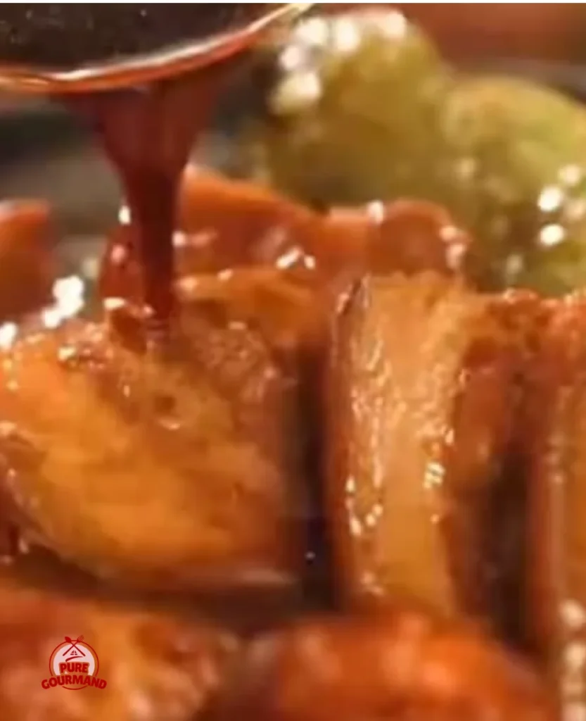Delicious tender braised pork belly cooked in rich soy sauce